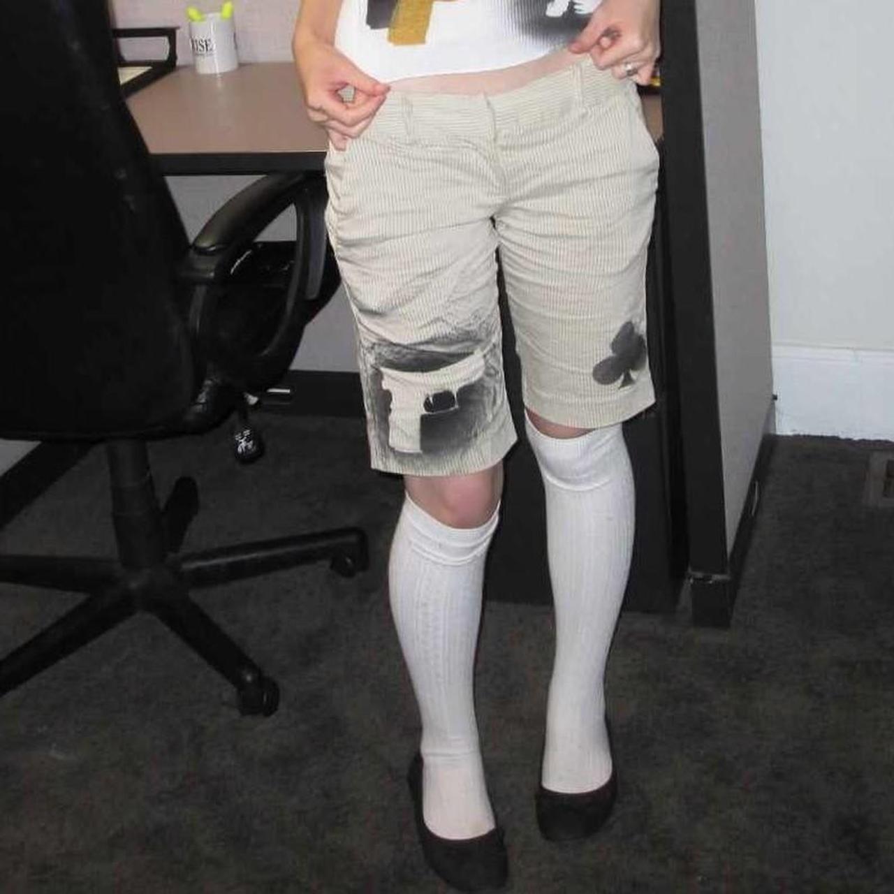 cream striped symbol shorts