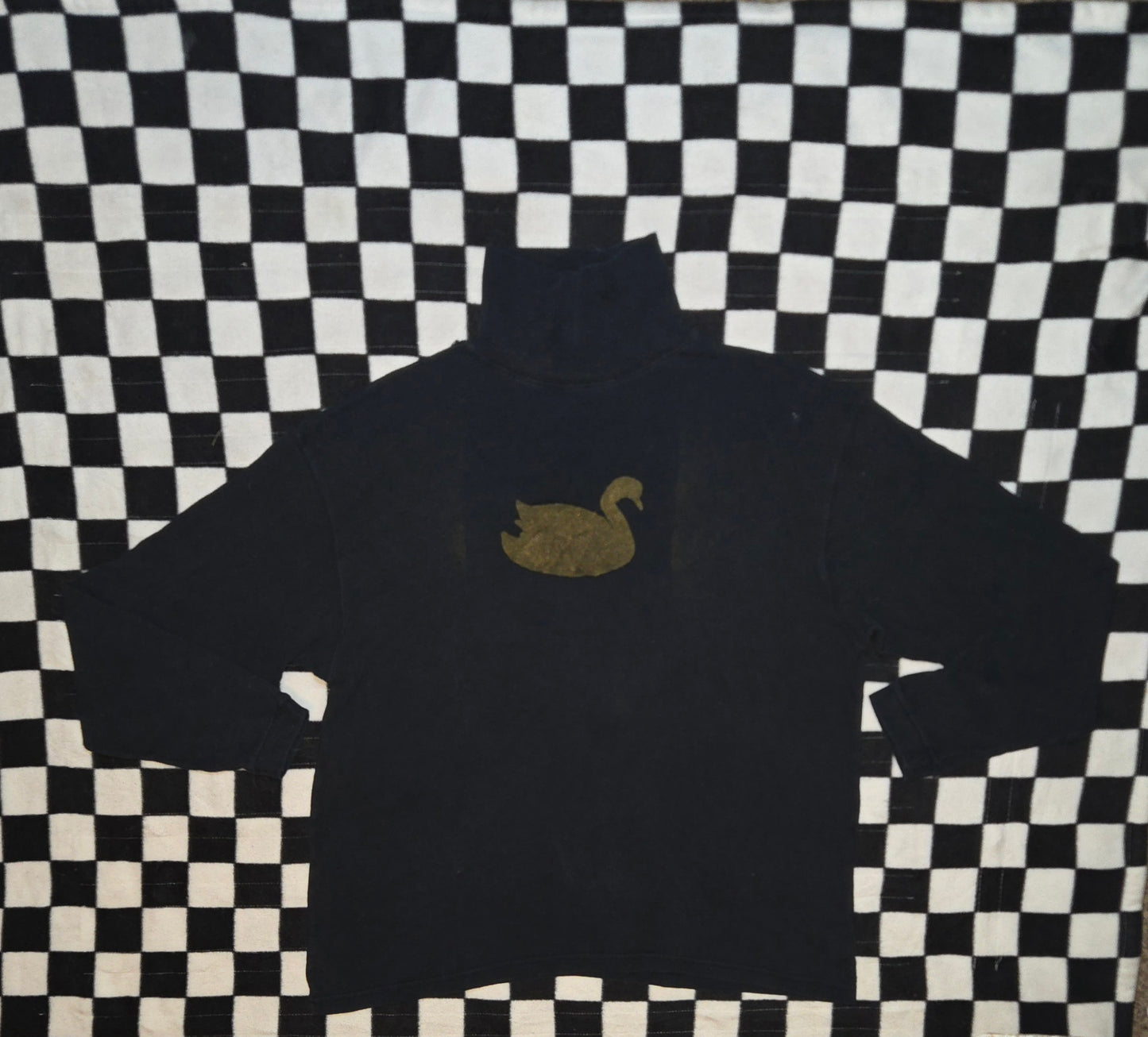 gold and black swan turtleneck