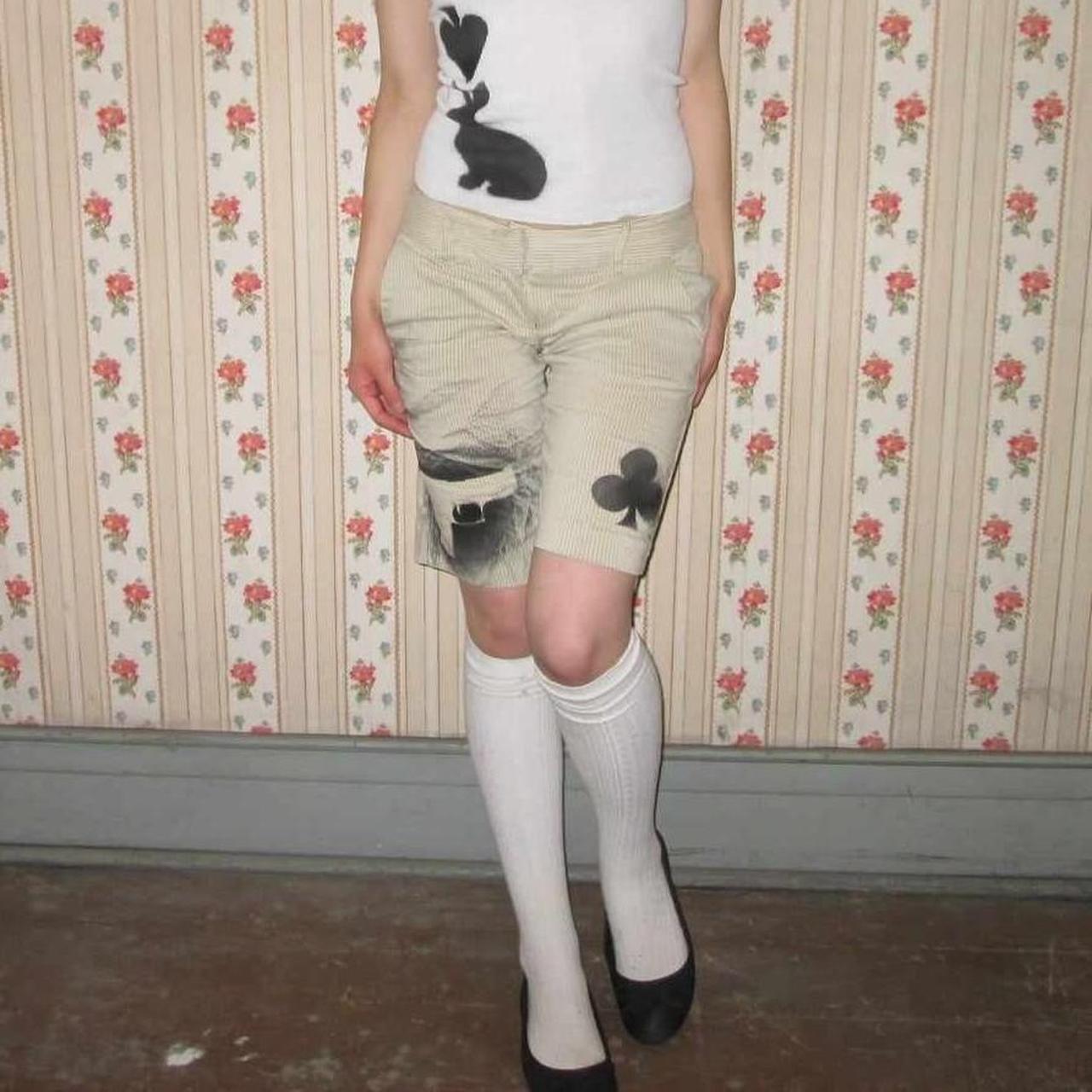 cream striped symbol shorts