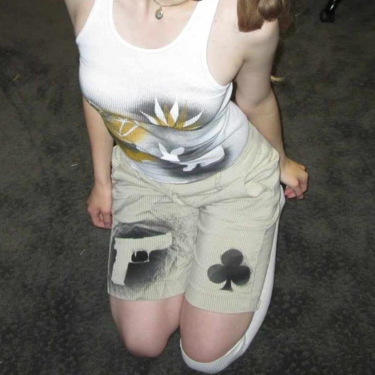 cream striped symbol shorts