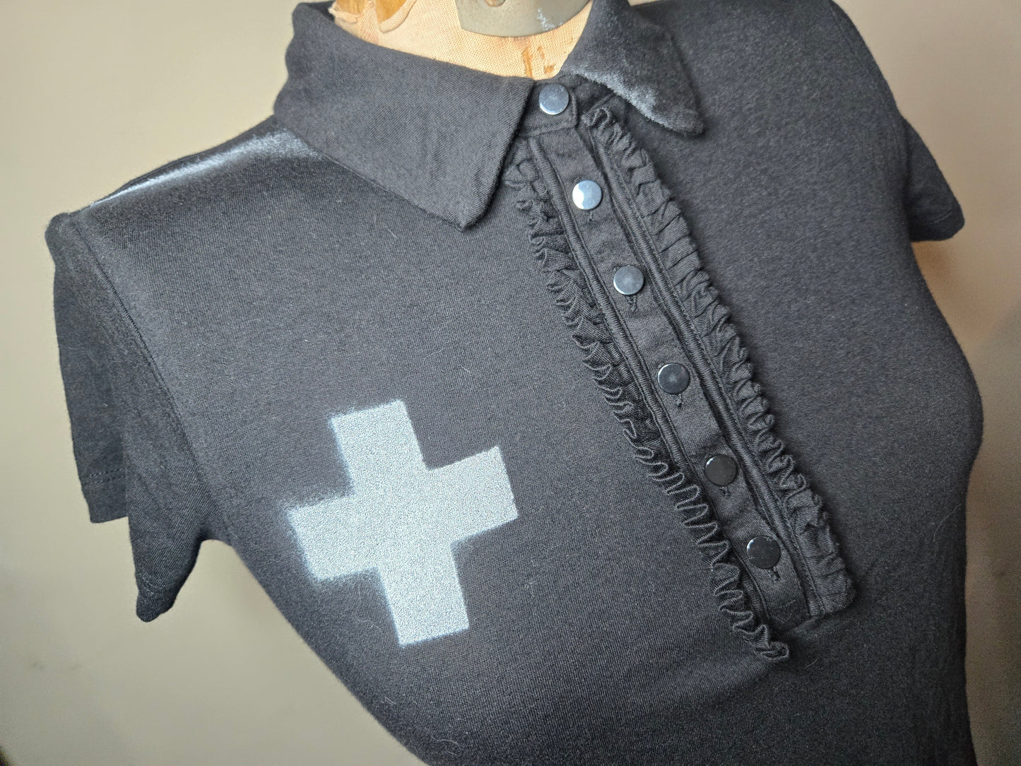 ruffled polo with cross