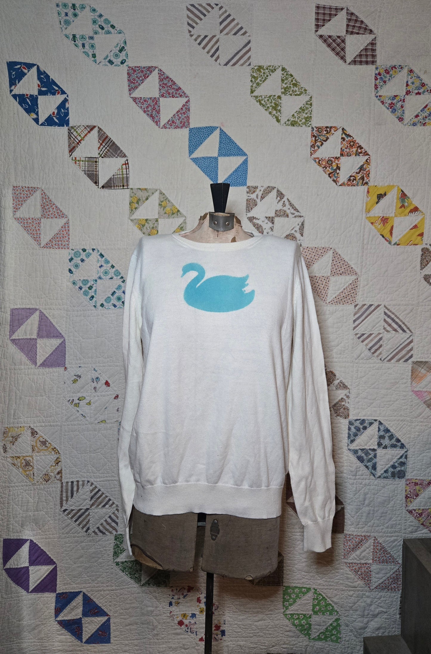 turquoise swan sweater